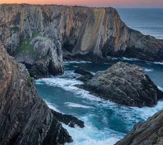 Wooden boardwalk along Costa Vicentina cliffs