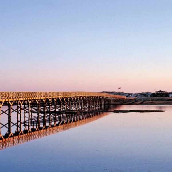 Wooden bridge at sunset in Algarve